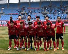 包含青岛黄海主场逼平辽宁沈阳宏运，难解难分的词条